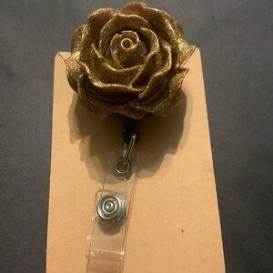 Gold rose shaped name badge